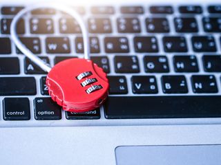A red lock on a laptop keyboard