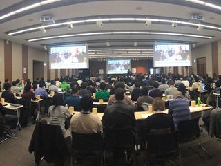 Auditorium full of people