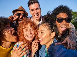 Group of friends from different ethnicities smiling