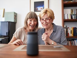 Senior women using a smart speaker