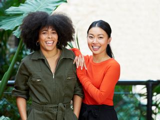 Two women posing and smiling