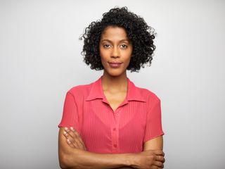 Woman standing with arms crossed